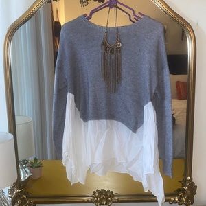 Grey sweater with white flare hem